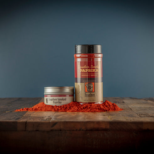 Bourbon Barrel Foods Bourbon Smoked Paprika in a shaker and a tin.